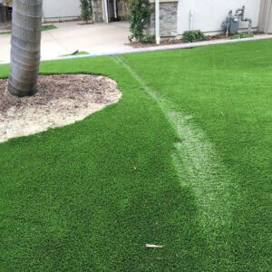 These Artificial Turf Streaks Are Caused by Sunlight from A Window Reflection