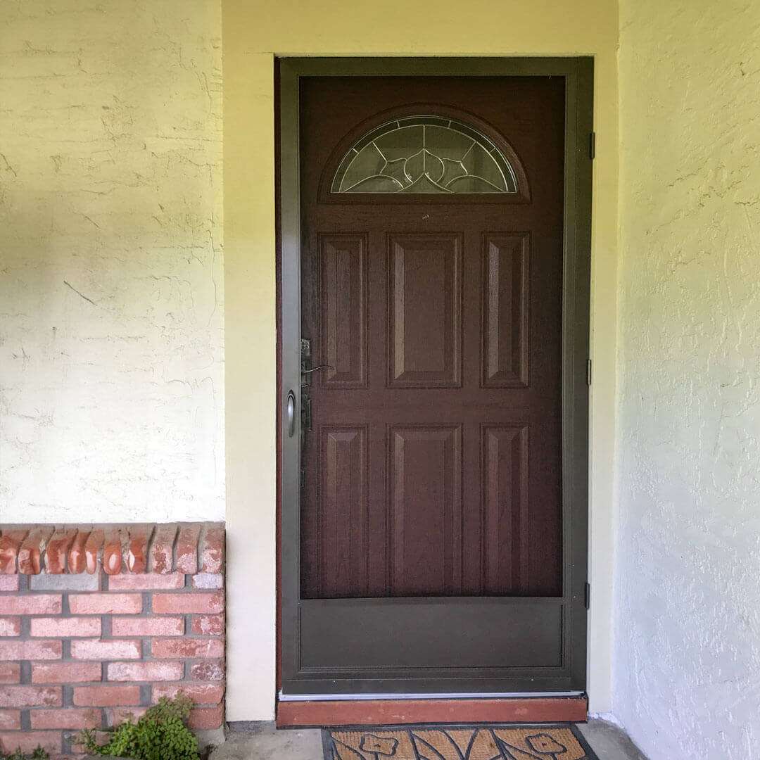 Swinging Screen Door on a Home Front Door